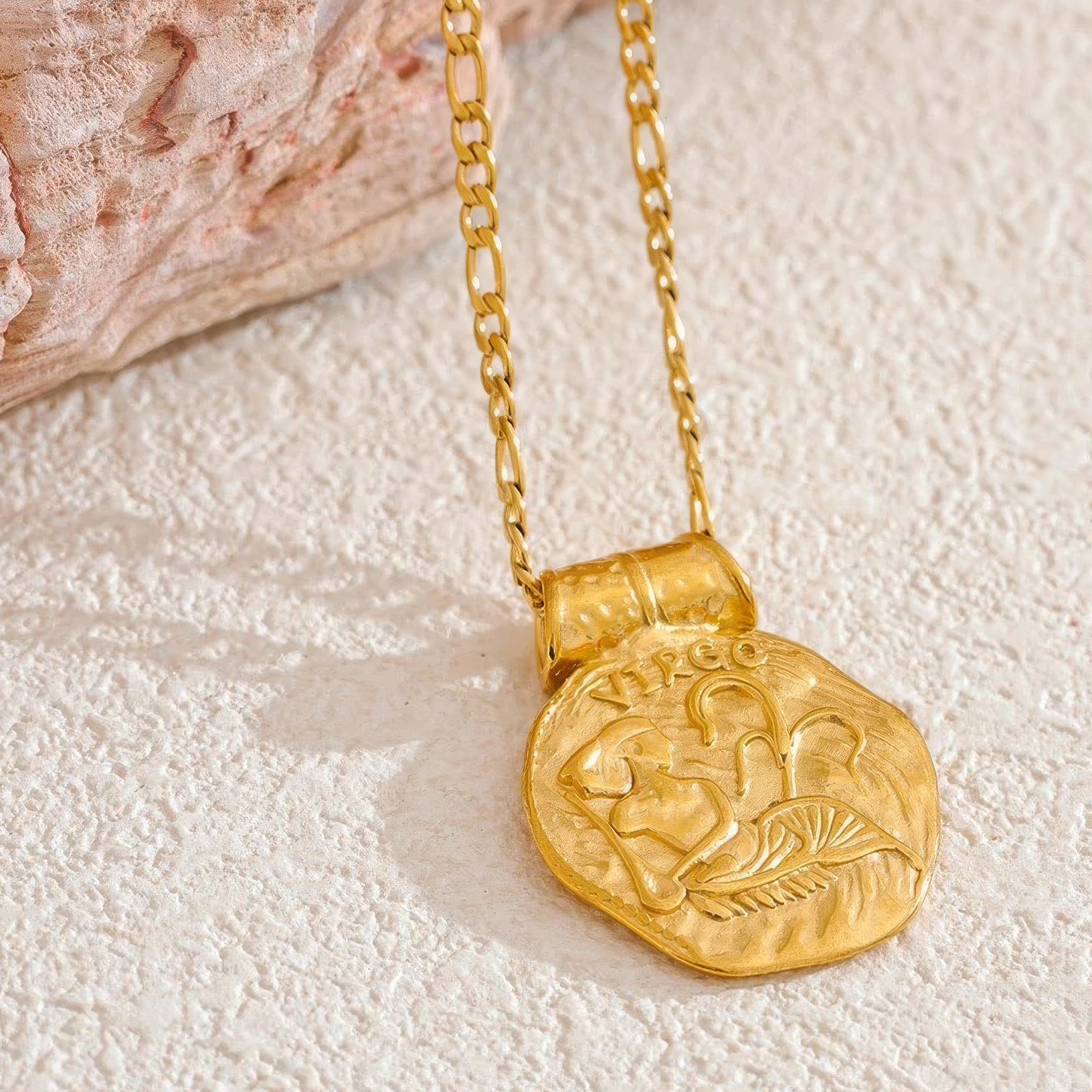 Naszyjnik z monetą zodiaku