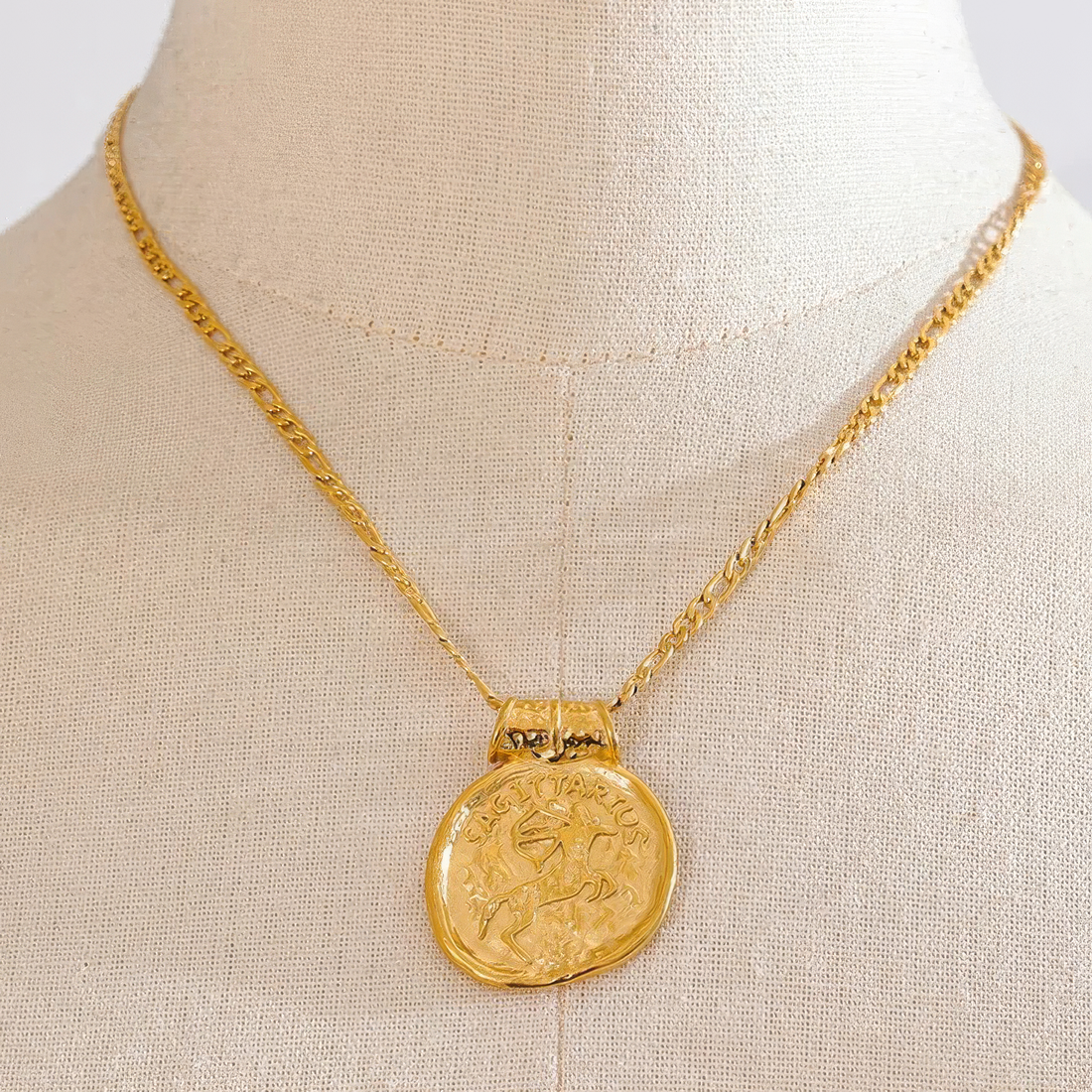 Naszyjnik z monetą zodiaku